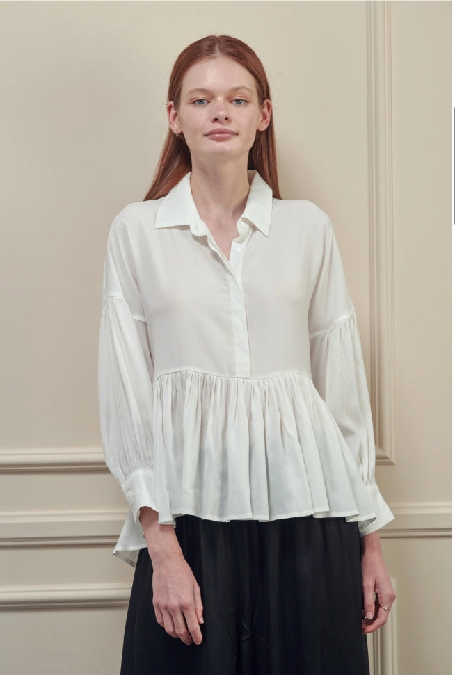SKIN LIKE BUTTER & CO ~ LIFESTYLE - Beautiful High Low White blouse with loose peplum silhouette
