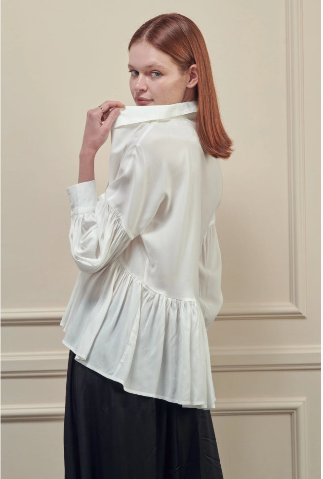 SKIN LIKE BUTTER & CO ~ LIFESTYLE - Beautiful High Low White blouse with loose peplum silhouette